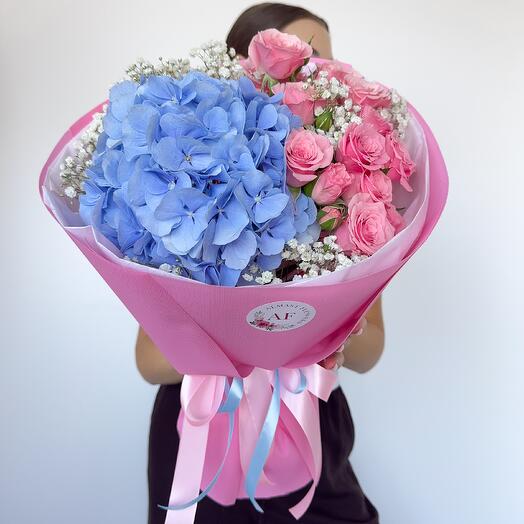Blue hydrangea with pink spray roses